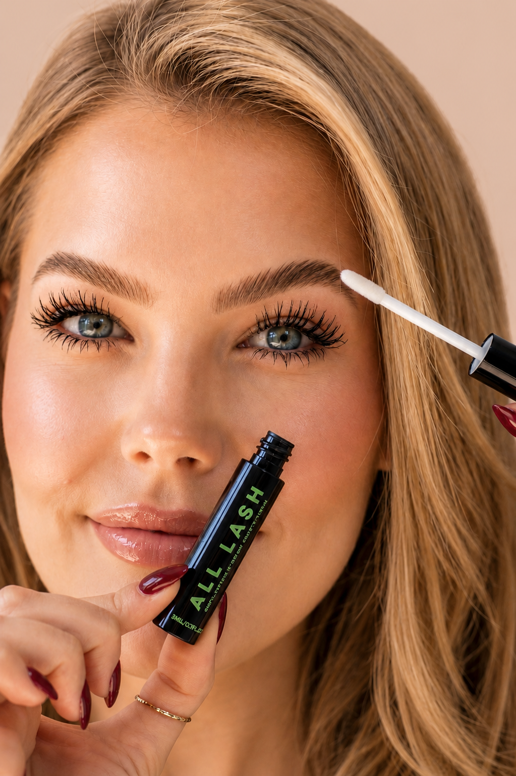 Woman applying ALL-LASH Brow Serum with Peptides for fuller, thicker, natural-looking eyebrows.